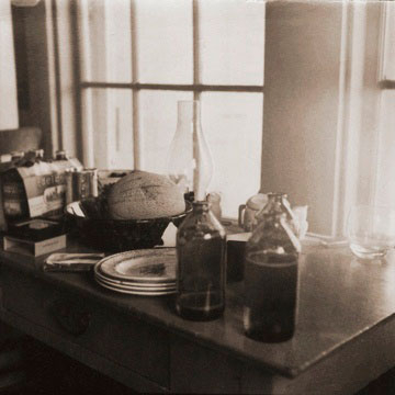 THE KEROSENE LAMP- A table for many uses, and a special desk for writing books